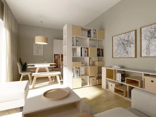 Multifunkcyjny salon z jadalnią i regałem dzielącym przestrzeń