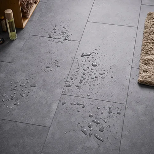 Rigid core flooring with integrated underlay IXPE VOX Rigio Concrete Dark arrangement
