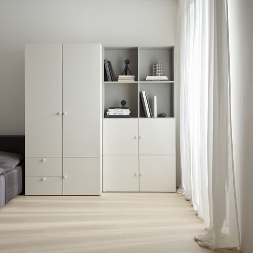 Wide bookcase with front arrangement 1 Reli arrangement