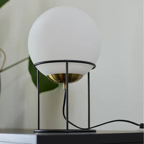 Lampa komodowa Moon Dyberg Larsen aranżacja